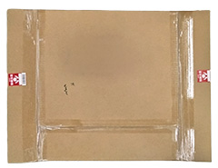 印刷物の両面を段ボールで挟んで梱包