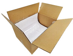 丸めた状態で段ボール箱に梱包