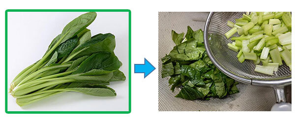 小松菜をさっと洗い、切りながら、軸の部分と葉の部分とを別々に分けておきます。